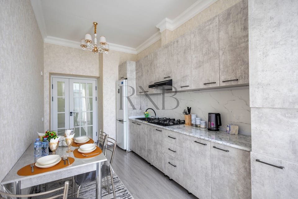 Family Condo, Balcony, City View | Private kitchen | Electric kettle