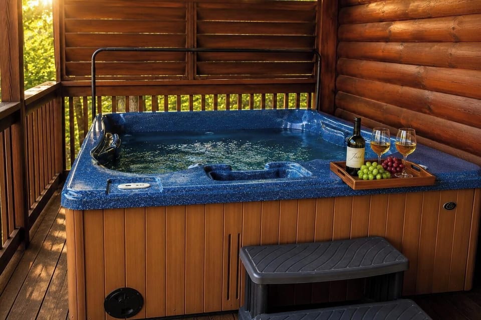 Soak in the private hot tub with wine in hand — your mountain escape awaits.