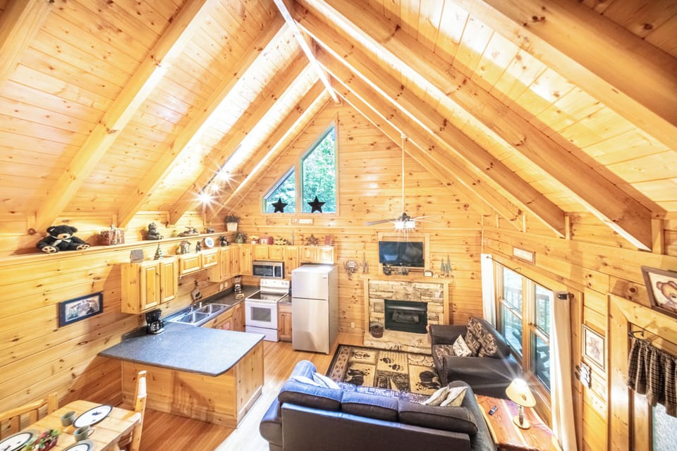Great Room: Enjoy stunning wood beams and a spacious layout perfect for family gatherings!
