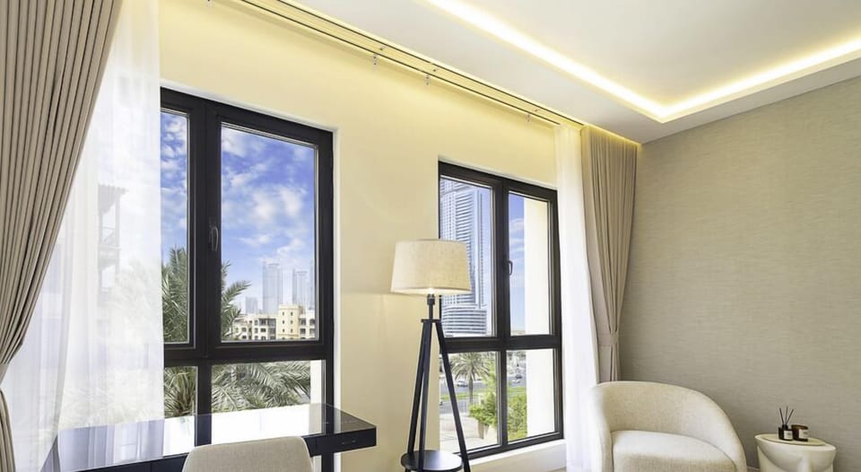 Apartment, City View | Living area | Flat-screen TV