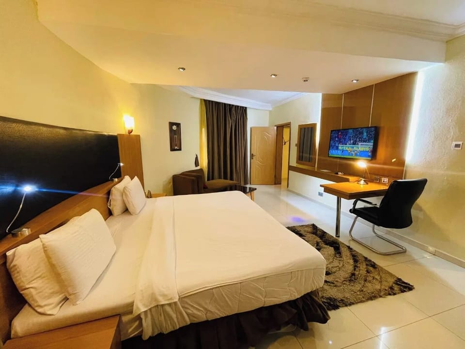 Deluxe Room, Balcony, City View | Desk, laptop workspace, free WiFi