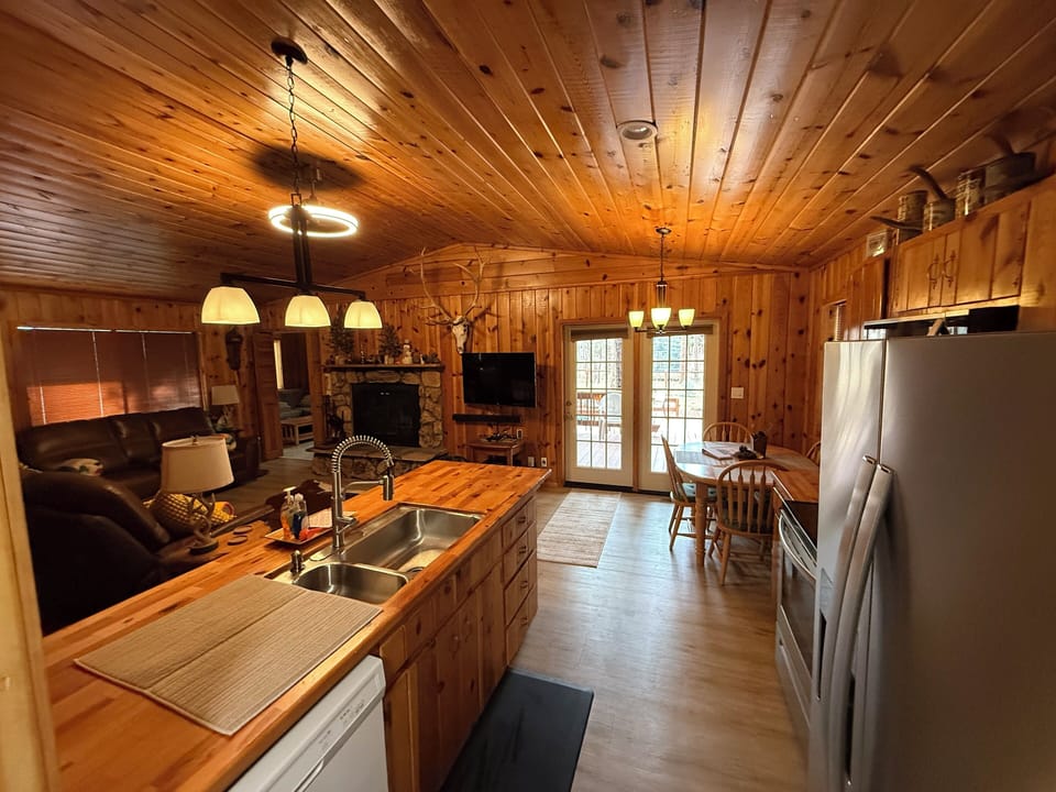 Kitchen Looking Towards French Doors That Lead To The Back Deck
