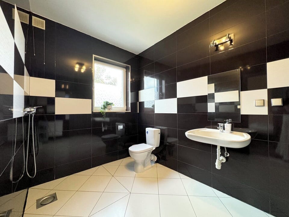 Basic Double Room, Private Bathroom, Ground Floor | Bathroom | Shower, soap, toilet paper