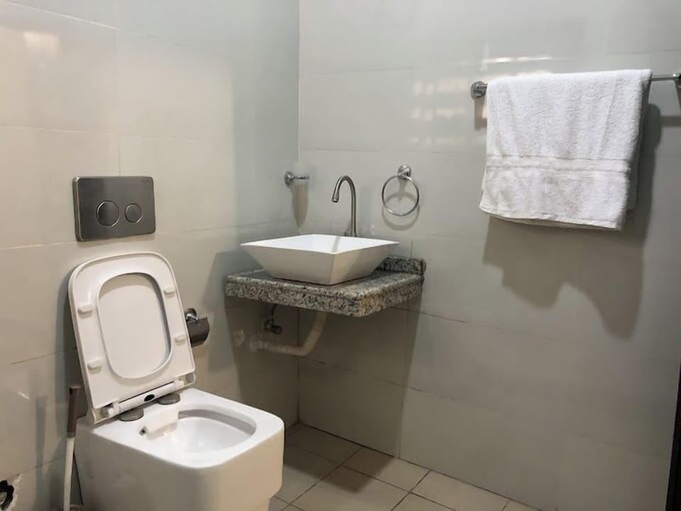 Deluxe Room, Balcony, City View | Bathroom | Free toiletries, hair dryer, towels, soap