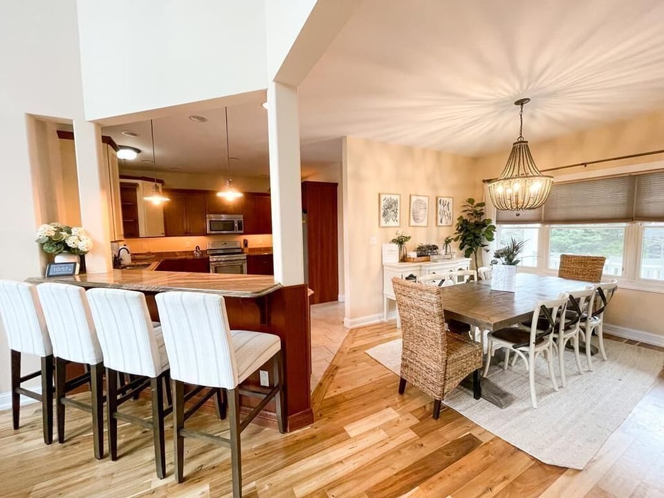 Dining area: large dining table seats 8, plus 4 counter seats.