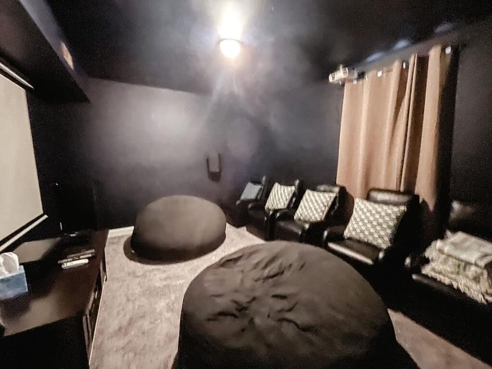 Theater Room; 115” projector screen plays cable TV, BluRay, or BYO game system,