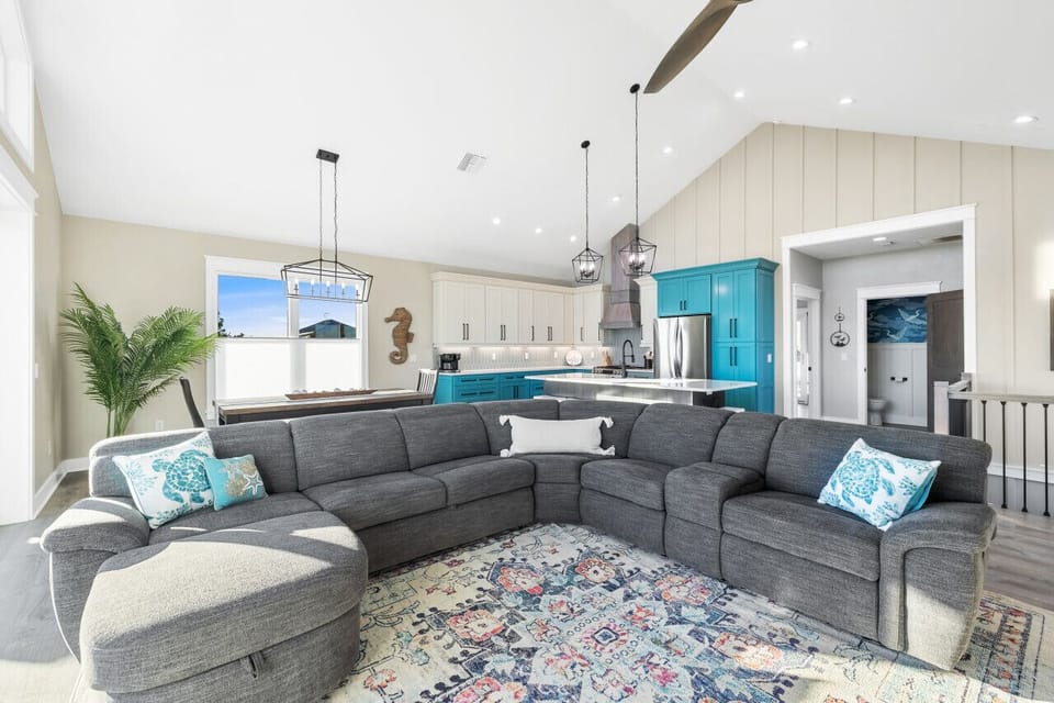 Natural light and high ceilings make the main living area bright and open