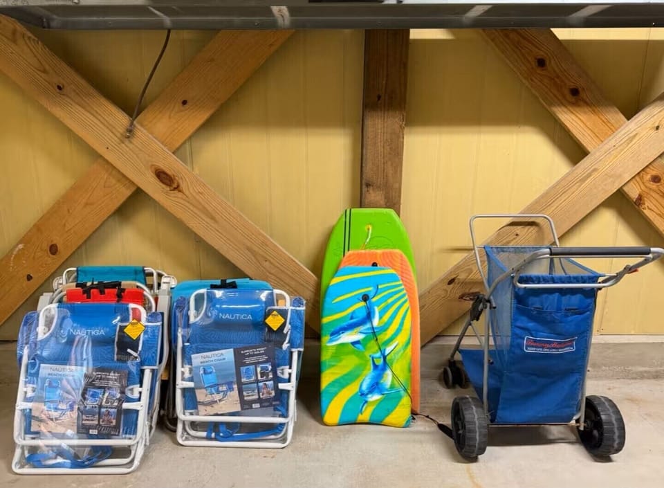 Pack light! We provide beach chairs, boogie boards, and a cart for you.