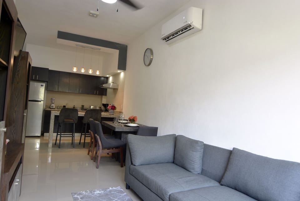 Basic Apartment, 1 Queen Bed, Kitchen | Living area | 40-inch LED TV with digital channels