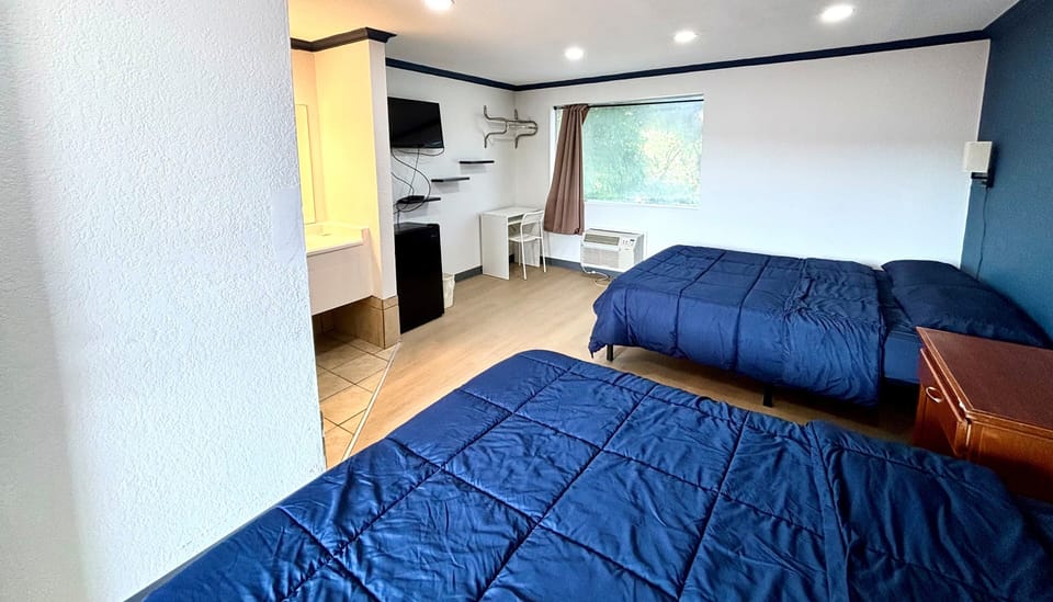 Double Room, 2 Queen Beds, Non Smoking | Desk, laptop workspace, free WiFi