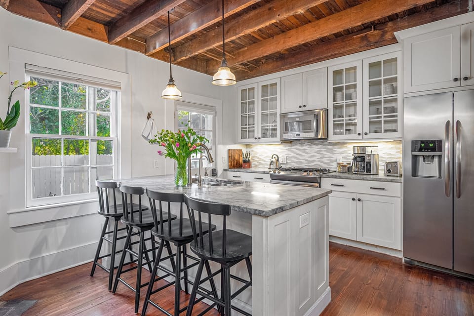 Cook in style in this fully equipped Chef's kitchen, where modern appliances meet historic charm.