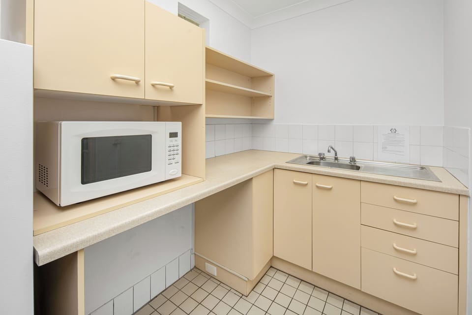 Family Room, Kitchenette | Private kitchen | Coffee/tea maker, electric kettle, toaster