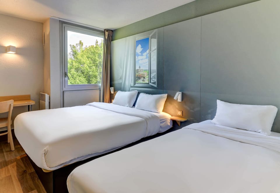 Triple Room, Non Smoking | Premium bedding, individually furnished, desk, blackout drapes