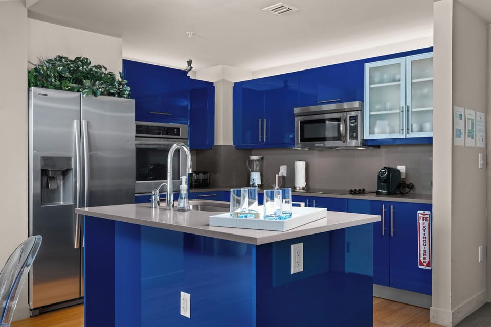 Sleek Blue Kitchen w/ Wall Oven, Flat Range & Coffee provided