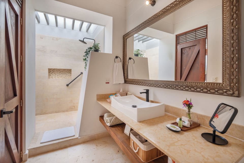 Family Room | Bathroom | Shower, hair dryer, slippers, towels