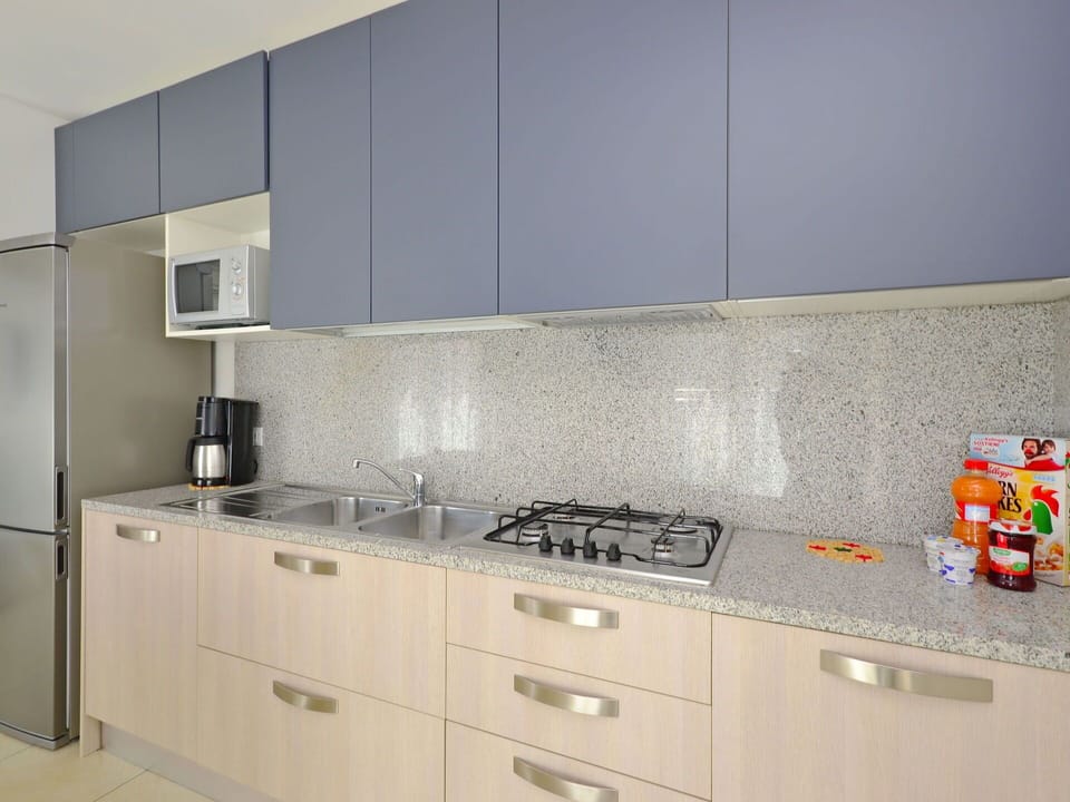 Kitchen, Kitchen Appliance, Countertop, Major Appliance, Cabinetry, Interior Design, Flooring, Stove, Home, Kitchen Stove