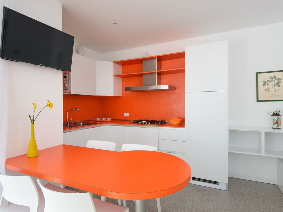 Interior Design, Wall, Furniture, Flooring, Wood, Kitchen, Floor, Orange, Countertop, Ceiling