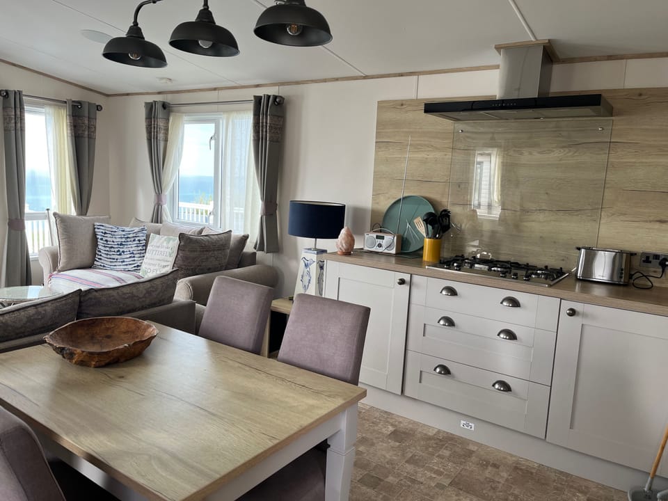 Open Plan Kitchen and living area onto seaview balcony
