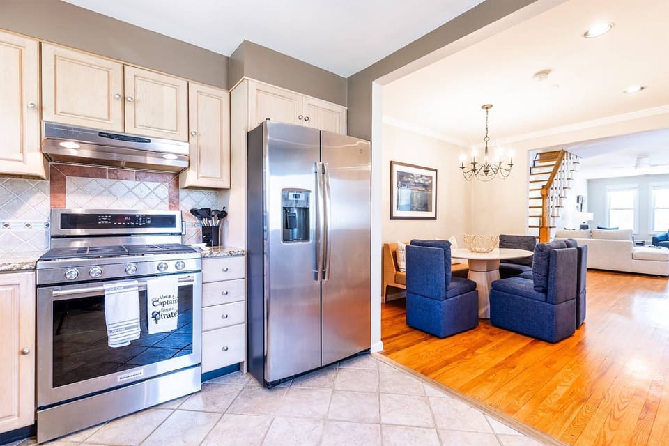 Head to the back of the home to the recently-renovated gourmet kitchen.