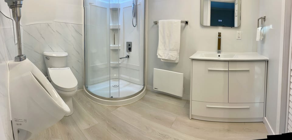 Deluxe Studio Suite, 1 Queen Bed, Garden View | Bathroom | Bathtub, hair dryer, slippers, heated floors