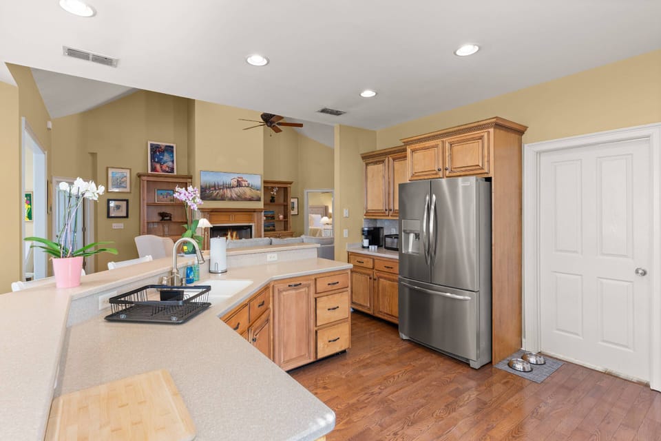 The kitchen includes a large walk-in pantry for storage and food.