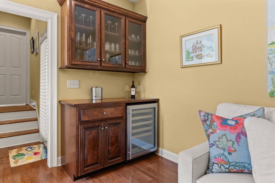 This beautiful bar & wine fridge in the den has everything you need to mix up your libations!