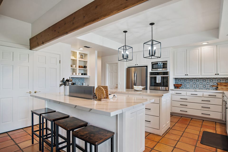 Barstools at the kitchen counter.