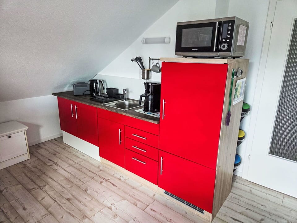 Flooring, Furniture, Kitchen, Floor, Cabinetry, Major Appliance, Kitchen Appliance, Countertop, Sink, Room