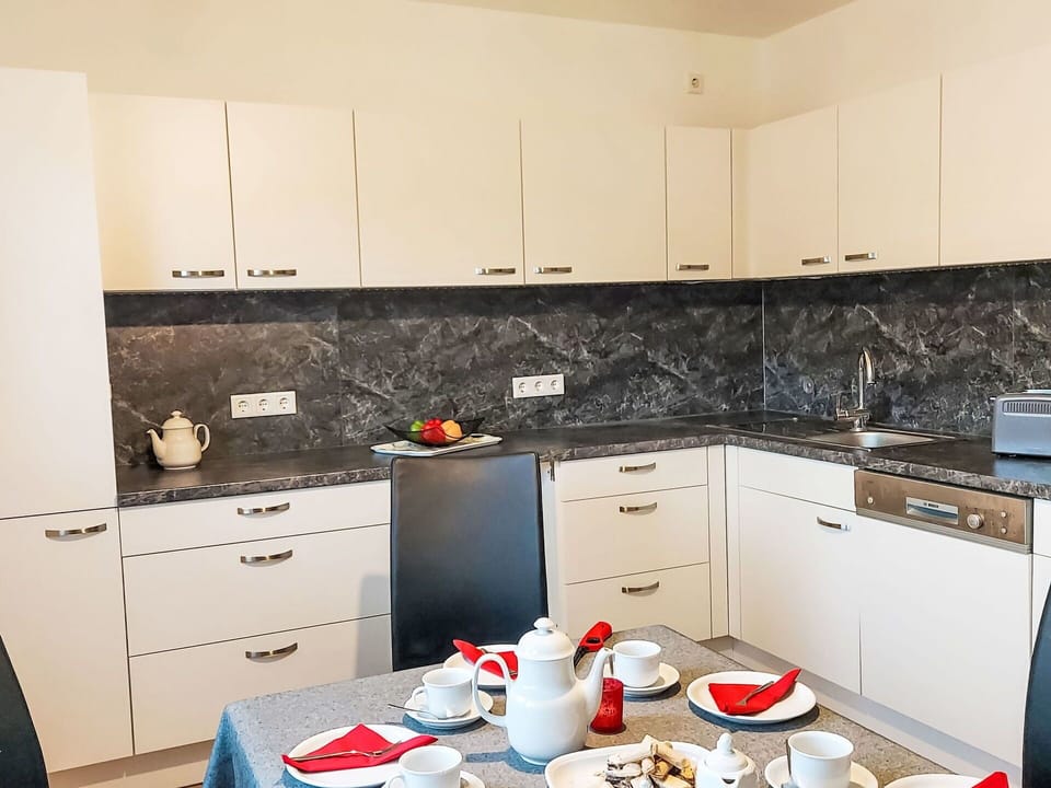 Cabinetry, Furniture, Property, Countertop, Wood, Kitchen, Drawer, Kitchen Appliance, Interior Design, Kitchen Stove