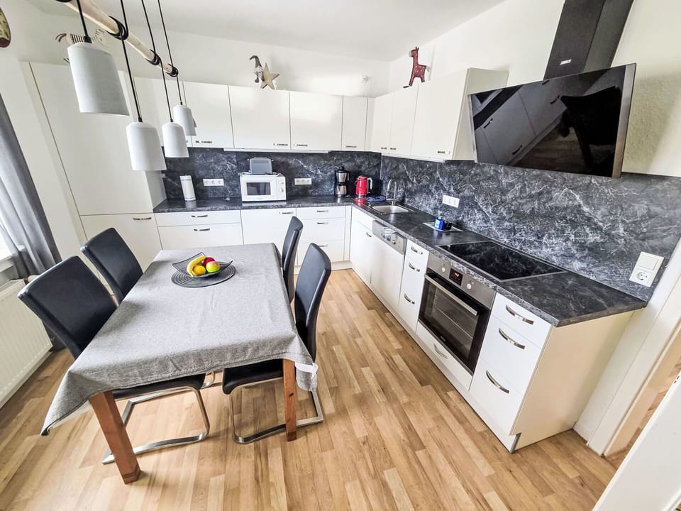 Kitchen, Flooring, Furniture, Wood, Kitchen Appliance, Floor, Countertop, Interior Design, Major Appliance, Home