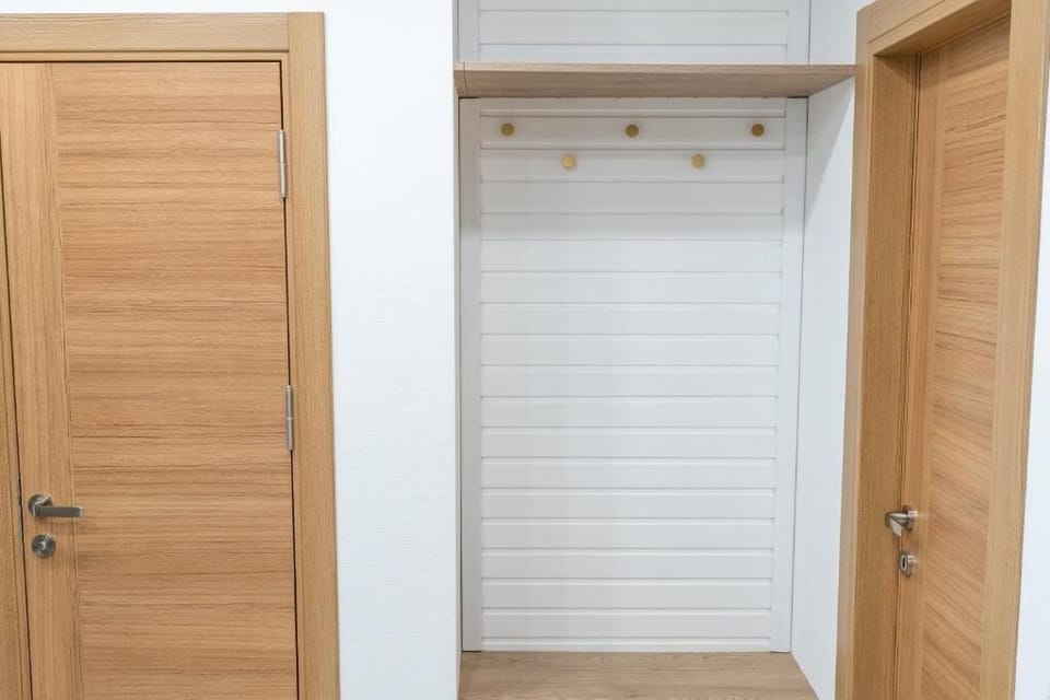 Family Suite, Balcony, Partial Sea View | Minibar, iron/ironing board, bed sheets