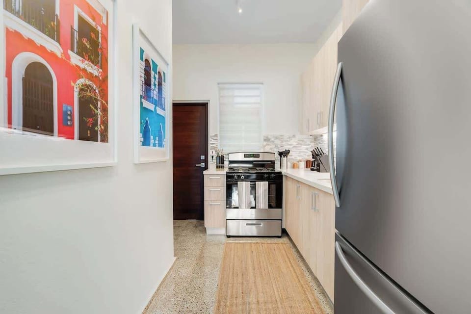 Enjoy a culinary adventure in this spacious, well-equipped kitchen with a contemporary touch.