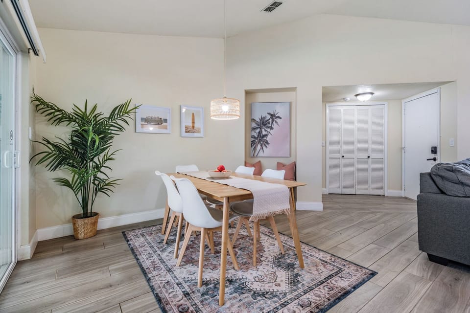 Gather around the elegant dining table, perfect for sharing meals and creating cherished memories with loved ones. A high chair is also available, making this space ideal for family dinners and meaningful moments together.