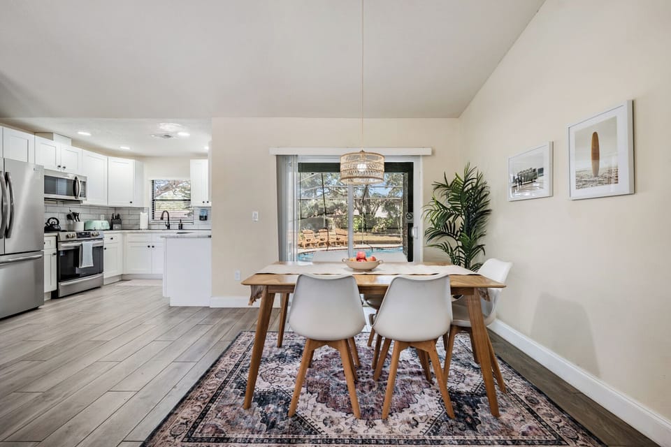 Gather around the stylish dining table that seats six comfortably. Perfect for shared meals or doubling as a workspace, this space combines elegance and functionality with plenty of room for family and friends to connect and enjoy.