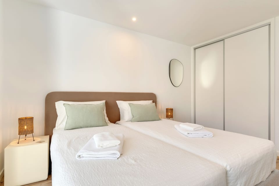 3 bedrooms, blackout drapes, soundproofing, iron/ironing board