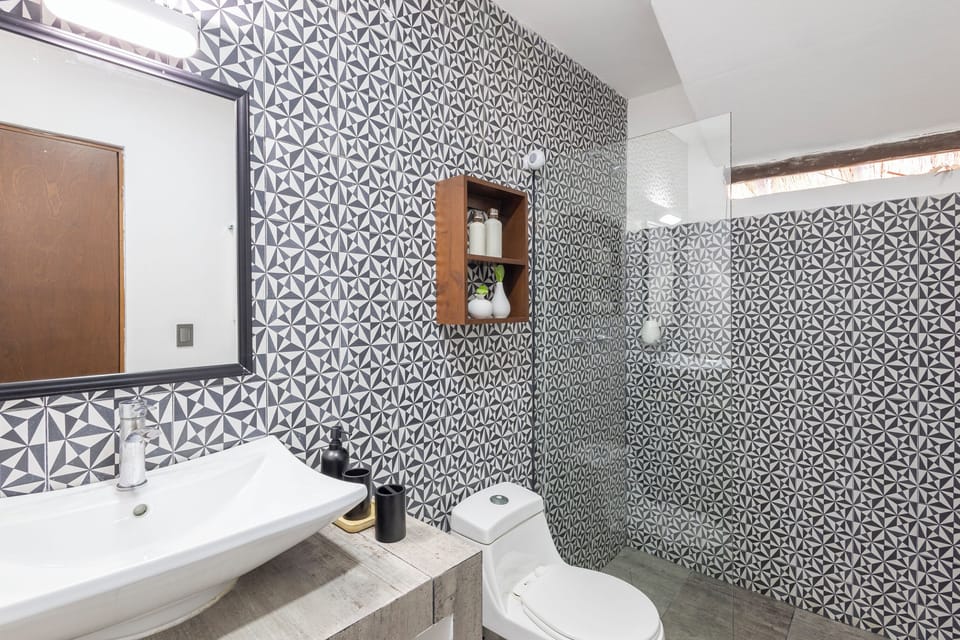 Luxury Suite, 1 King Bed, Private Bathroom, Sea View | Bathroom | Shower, rainfall showerhead, towels, soap