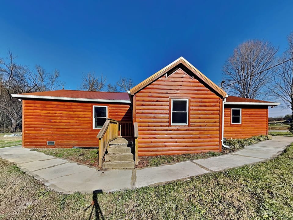 Exterior w/ Entrance to Laundry Room