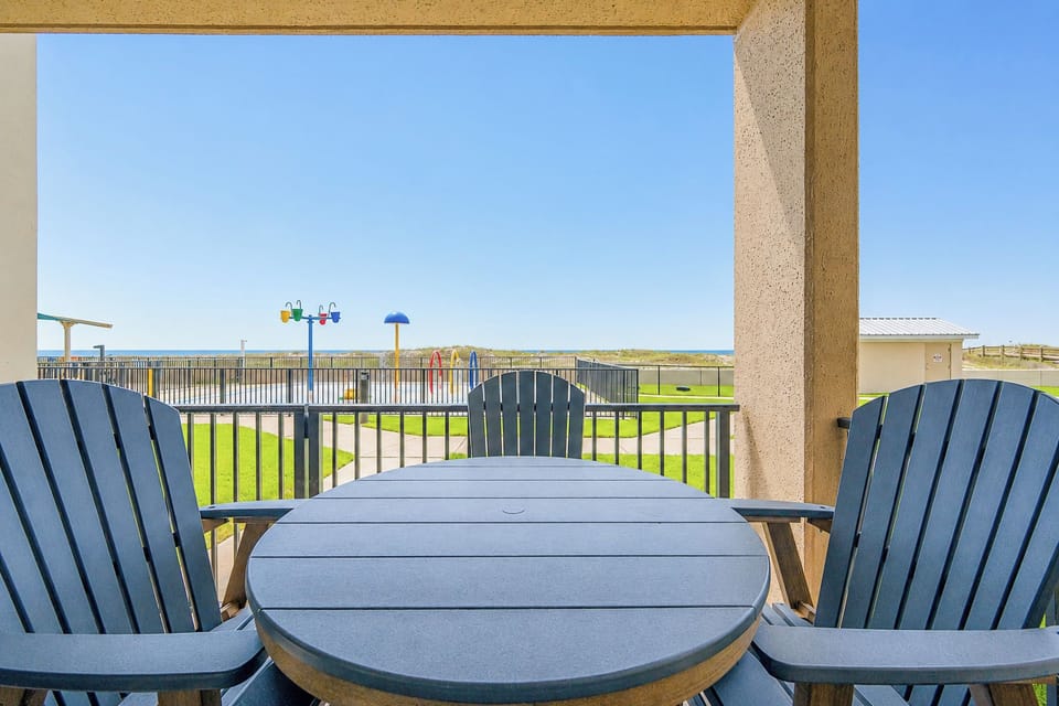 Discover the pool area off your patio with a splash area for the kids, sparkling pool, and boardwalk to the beach
