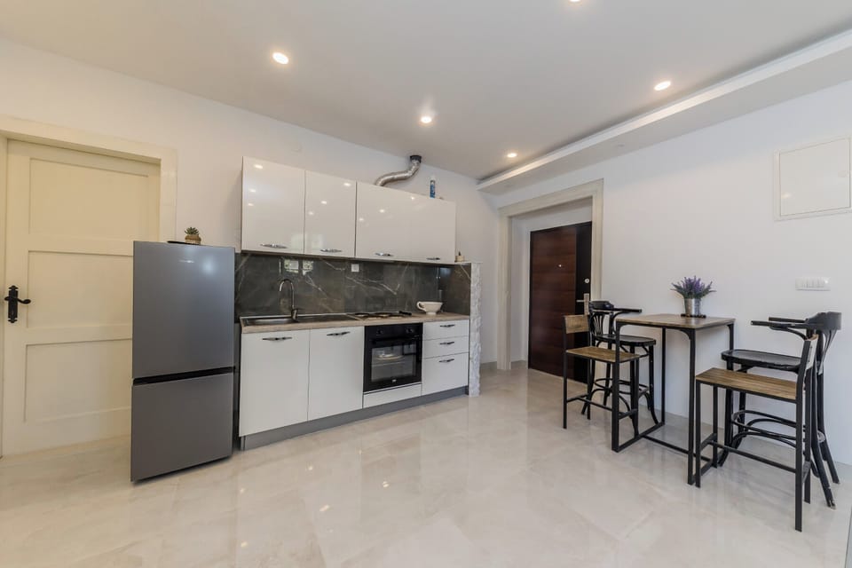 Apartment | Private kitchen | Fridge, microwave, stovetop, electric kettle