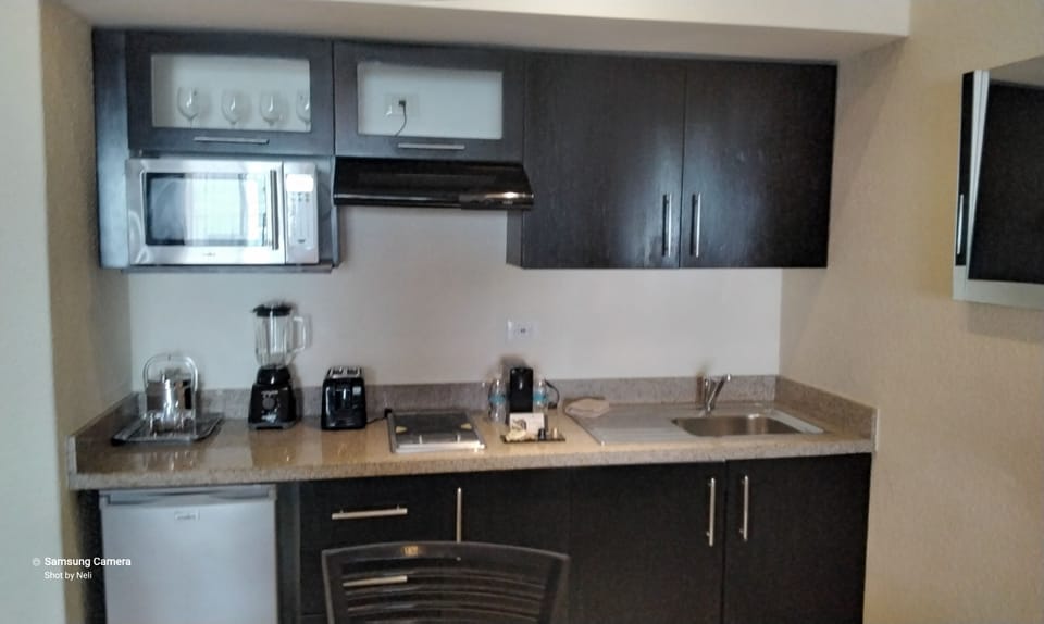 Junior Suite, Balcony, Ocean View | Private kitchen | Fridge, microwave, oven, cookware/dishes/utensils