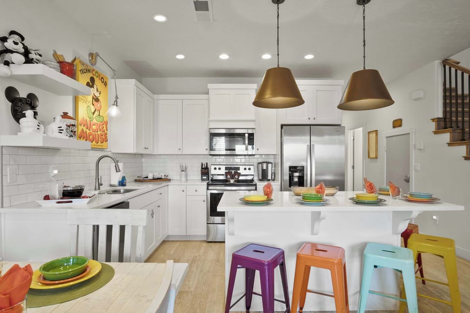 Enjoy breakfast at the counter, offering additional seating for 5