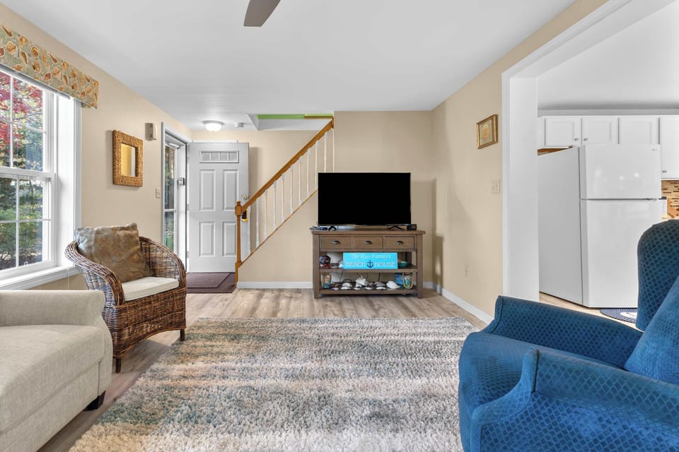 Curl up in the homey living room & stream all your favorite entertainment