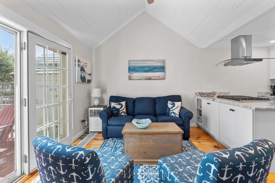 Curl up in the coastal living room & stream your favorites on the smart TV