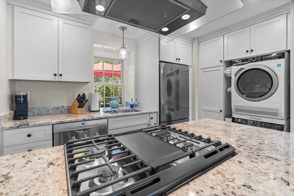 The open, airy kitchen offers ample space & all the comforts of home