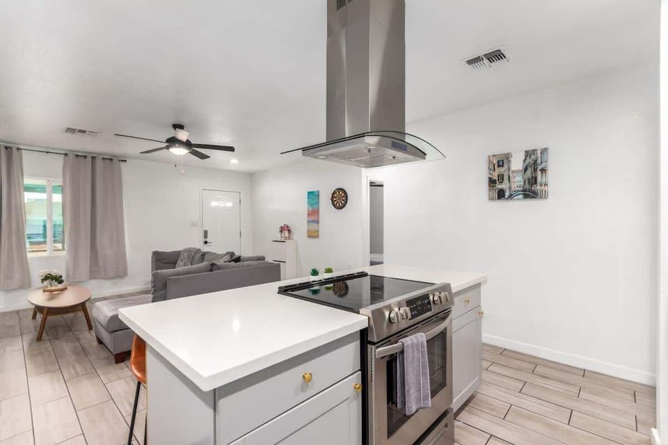 Spacious and open-concept dining and living area, blending comfort and functionality for family gatherings.