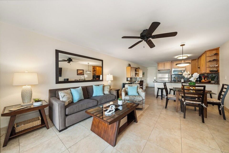 A warm and inviting space with a full kitchen and comfortable lounge area