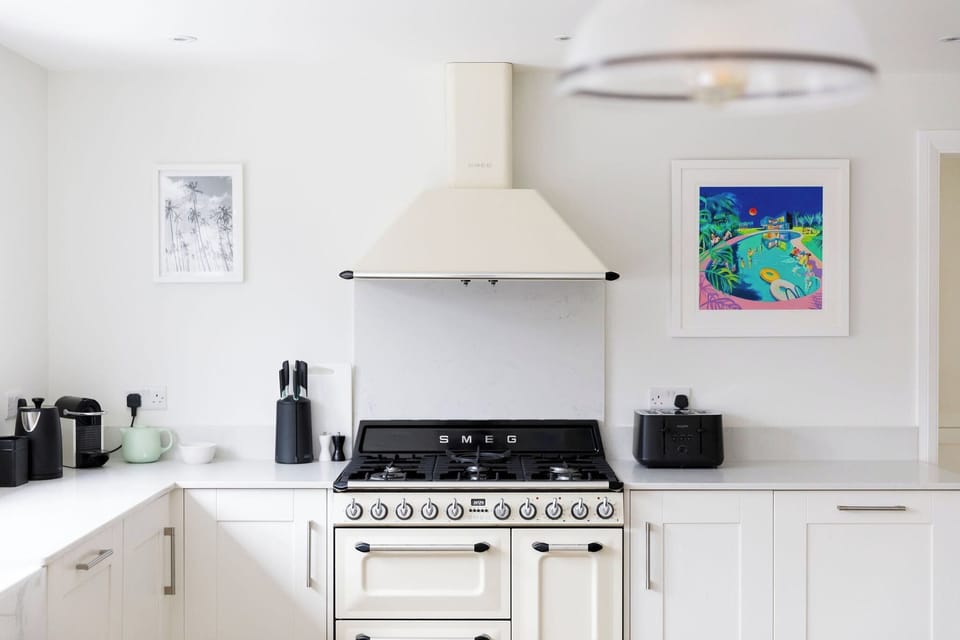 In the spacious kitchen there is a Smeg oven with gas hob, toaster, kettle and Nespresso machine to use during your stay.