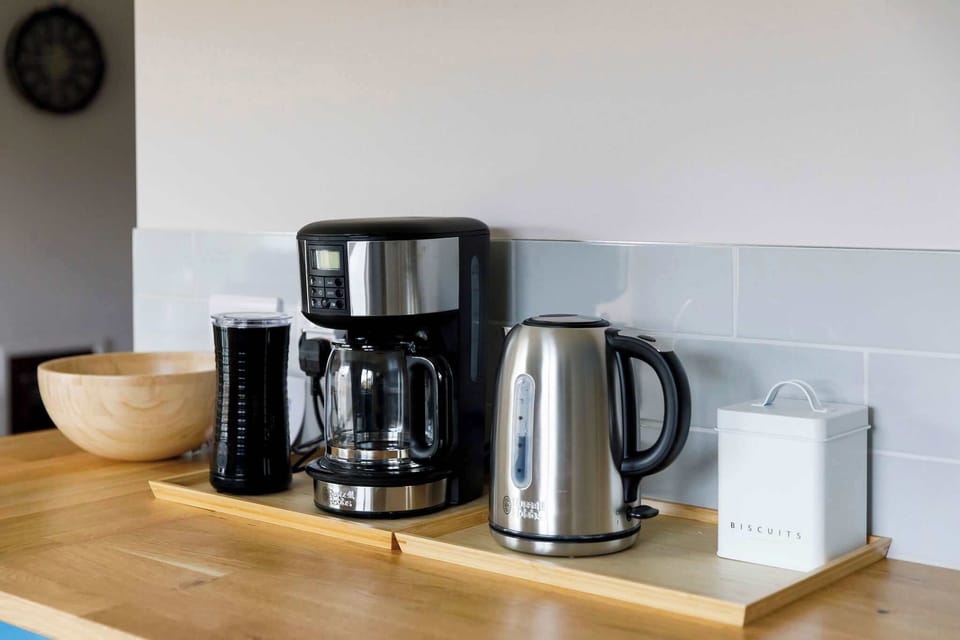 The home has a filter coffee machine, milk frother and kettle.