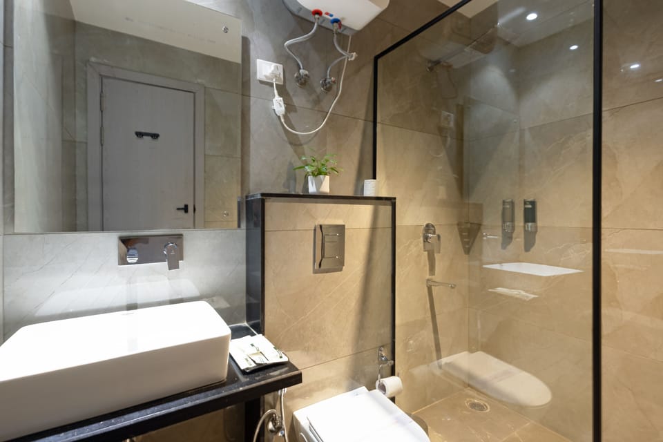 Shower, free toiletries, hair dryer, slippers