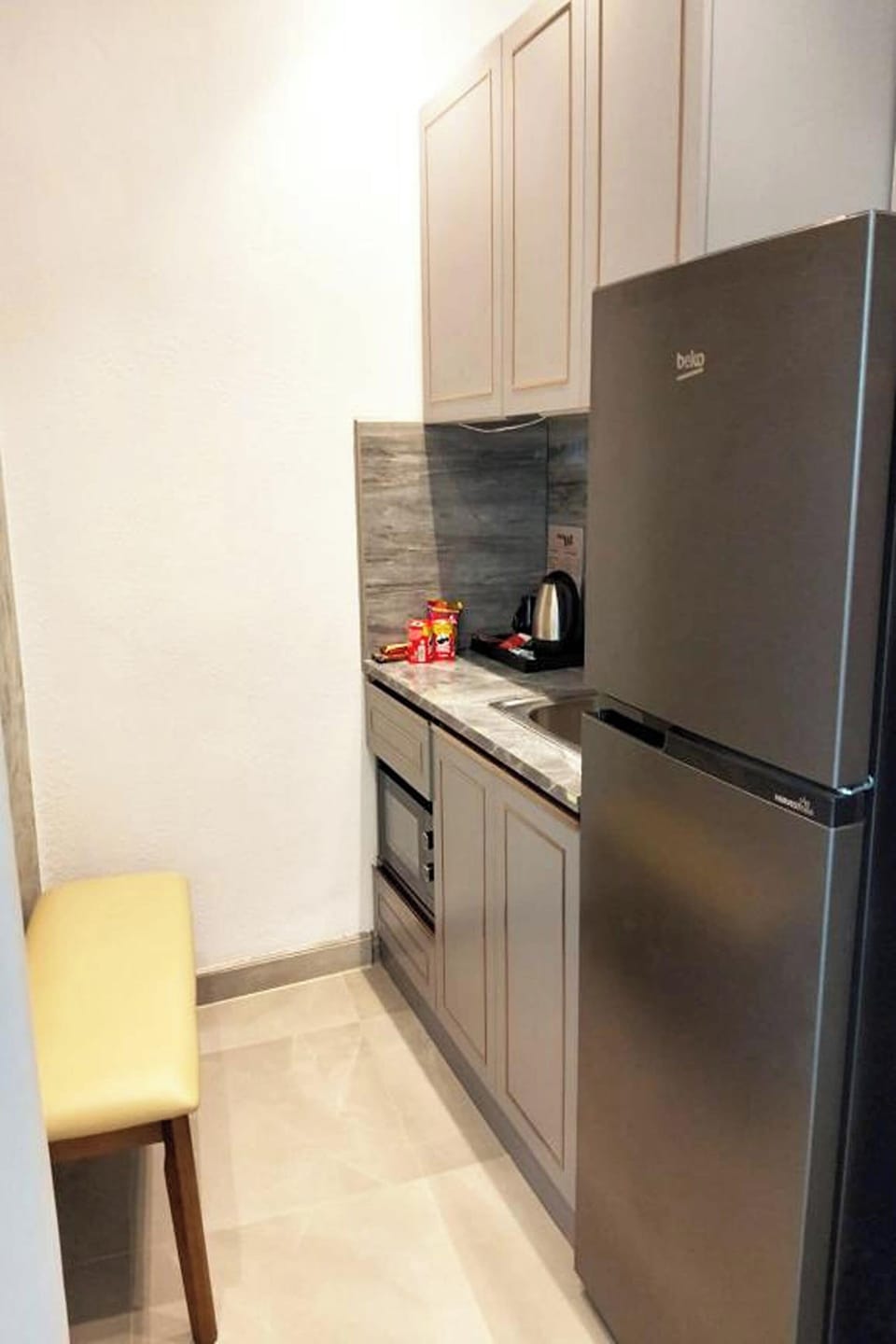 Premium Suite | Private kitchenette | Coffee/tea maker, electric kettle